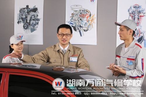 湖南万通学子在老师的指导下，掌握扎实汽修技术，做到”靠自己成功“